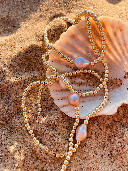 Single pearl stretch bracelet